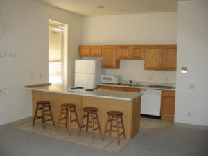 Kitchen with oak cabinets and breakfast bar